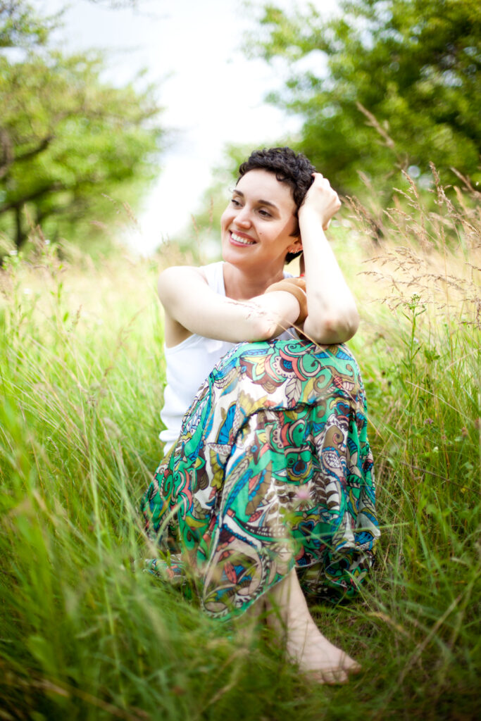 girl resting on fresh spring grass
